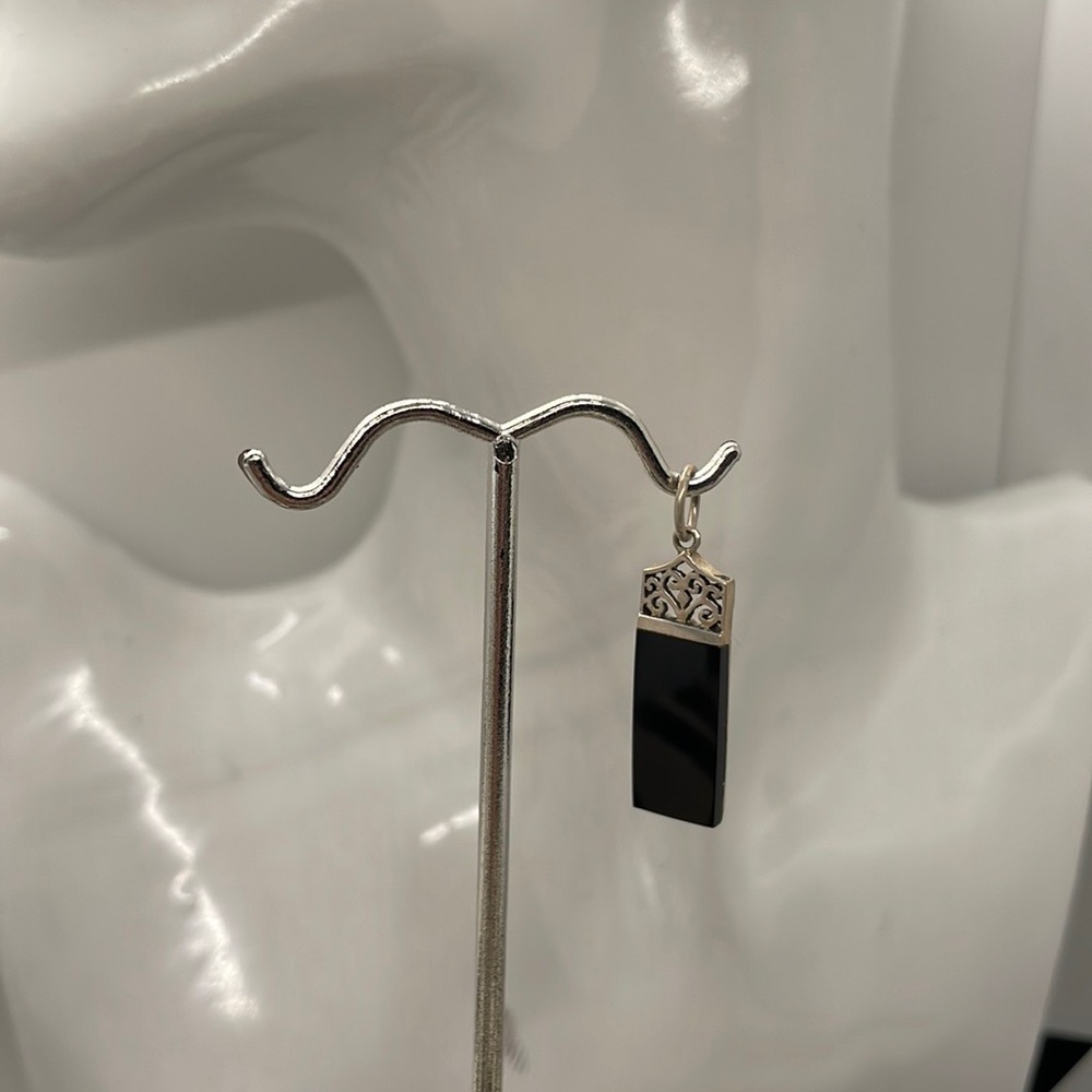Craved Sterling Silver with a Piece of Onyx Pendant